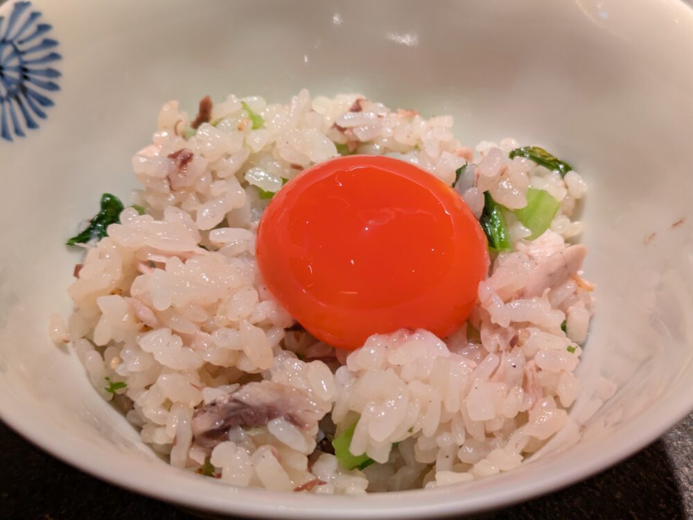 銀座有涯の鰤土鍋ご飯卵黄乗せ